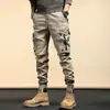 Overol de marca de moda para hombre de primavera y otoño, corte ajustado, tobilleros, pantalones guapos Ruan, invierno, motocicleta americana, multibolsillos, pantalones negros
