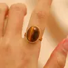 Anillo Cruzado Europeo y Americano de Acero Inoxidable con Forma Especial Calada Piedra Ojo de Tigre Perla Anillo para Dedo Índice de Mujer Nicho de Gama Alta Anillos