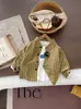 Ropa de primavera para niños y niñas 2026 nueva elegante infantil primavera y otoño camisa de dibujos animados chaqueta a cuadros nuevo dibujos animados casual