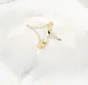 El juego de anillo y pulsera de moda de lujo más vendido de Amazon con diseño de ráfaga de estrellas calado y diamantes