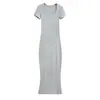 Chica sexy picante muestra figura vestido largo de un solo paso para mujer verano nuevo elástico ajustado cuello trapezoidal manga corta vestido de cadera