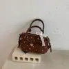 Bolso de almohada de lunares de moda transfronterizo 2026 nuevo modelo para el trabajo de alto valor bolso de mano versátil para el hombro debajo del brazo bandolera