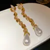 Pendientes de Reloj de Bolsillo Asimétricos con Incrustaciones de Perla de Aguja Plateada y Diamante Pendientes de Botón Exquisitos Retro Franceses con Sentido de Diseño Pendientes de Nicho Venta al por Mayor