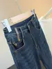 Jeans boca de sino azul escuro retrô para mulheres, nova moda outono, cintura alta, elástico, corte justo, calças boca de sino que valorizam a silhueta