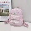 Cabeça de Coelho Fofa 2026 Início do Outono Nova Moda Fresco Grande Capacidade Design de Nicho Estampa de Estrela Mochila Texturizada