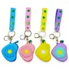 Porta-moedas de Silicone Desenho Animado Criativo Bolsa para Fones de Ouvido Pingente de Chaveiro Venda por Atacado Mini Bolsa Pingente de Chaveiro