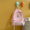 Mochila feminina macia e fofa na cor creme, simples e versátil, pequena mochila fofa de desenho animado, mochila escolar, mochila