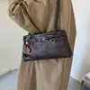 Moda retro japonesa nicho 2026 nuevo bolso de mano coreano de gran capacidad para mujer, bolso de hombro y axila de otoño