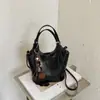 2026 Bolso Cubo Chic Simple Estilo Coreano Bolso de Hombro Cruzado Retro a la Moda Bolso de Mano de Personalidad para el Trabajo Diario