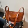 Bolsa Cruzada Simple para Viajes de Negocios de Comercio Exterior para Mujer 2025 Nueva Bolso de Hombro Casual de Cuero Encerado Bolso de Albóndiga de Gama Alta