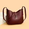 Bolsas Pequeñas de Moda Populares para Mujer Primavera 2026 Nuevo Bolso Cruzado de Alta Gama Bolso de Hombro Bajo el Brazo Bolso Tipo Cubo Color Café