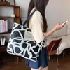 Bolsa de Lona Feminina 2024 Nova Estudante Grande Capacidade Bolsa de Mão Estilo Academia de Artes Bolsa de Ombro Simples LOGO Estampado