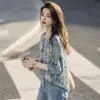 Camisa Floral de Tencel de Nuevo Estilo Verano 2026 Estilo Francés para Commuter Adelgazante Chic Holgada Impresionante Camisa Protector Solar