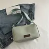 Outono 2026 Nova Bolsa de Lona da Moda Tendência Bolsa Transversal Feminina Bolsa de Ombro Leve Bolsa de Cor Sólida