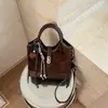 Bolso de mano pequeño de alta costura Ruien para mujer, nuevo y moderno bolso cubo de hombro y cruzado para ir al trabajo, otoño 2026