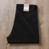 Pantalones casuales rectos de negocios para hombre de mediana edad, finos, color caqui, holgados, transpirables, lavados, microelásticos, para verano 2024