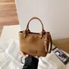 Bolsa de Cubo de Agua Portátil de Gran Capacidad Transfronteriza para Mujer Nuevo Estilo 2026 Moda Simple Casual Lujo Ligero Nicho para Viajar Bolso de Hombro Único