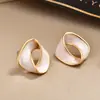 Pendientes de gota de aceite de banda de Möbius retro franceses Diseño de nicho Lujo ligero Esmalte Accesorios de pendientes de moda
