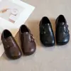 Zapatos de Cuero Genuino para Niños Estilo Británico Primavera y Otoño 2026 Suela Suave Zapatos Individuales para Niños Zapatos de Desempeño para Niños Zapatos de Tabla para Bebés Negros