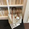 Bolsa casual grande transfronteiriça para mulheres, nova bolsa de ombro versátil da moda de verão para estudantes universitários, bolsa tote de ombro