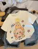 Camiseta Nueva para Niñas Modelo 2026 con Estampado 3D, Algodón Puro Manga Corta Verano Holgada Estampado de Dibujos Animados Muñeca Top Padre-Hijo