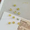 Pedras de strass para manicure douradas, modernas e deslumbrantes, apresentando designs de floco de neve, estrela de cinco pontas e cristal de vidro redondo com base pontiaguda, usadas como acessórios decorativos
