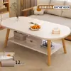 Mesa de café moderna minimalista con patas de madera maciza de moda, adecuada para salas de estar pequeñas, mesa de té estilo crema, mesa pequeña simple