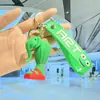 Nuevo Llavero de Venta Caliente del Nuevo Shan Hai Jing Extranjero Diseño Abstracto Palo de Madera Figura Humana Novedad Caja Misteriosa Colgante para Mochila