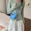 Bolso pequeño súper popular estilo coreano para mujer, nuevo bolso cruzado vintage de gamuza primavera-verano 2025, bolso de mano de moda tipo albóndiga