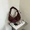 Bolso de media luna de diseño nicho, casual y moderno, para mujer, nuevo bolso tipo bollo 2026, bolso de hombro para llevar debajo del brazo para la ciudad, bolso de moda