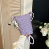 Bolso versátil de diseño de nicho transfronterizo para el día a día, nuevo bolso tejido para teléfono móvil 2026, bolso de hombro/cruzado moderno y sencillo