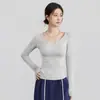 Roupas de Yoga Outono e Inverno Gola Redonda Emagrecedoras Manga Longa Ajustadas Fio de Alta Elasticidade Tops Esportivos Roupas para Corrida Treinamento Fitness Venda por Atacado