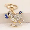 Chaveiro Personalizado Criativo de Cavalo de Madeira com Nariz Arredondado Cravejado de Diamantes, Acessório Fofo de Mochila em Desenho Animado, Pequeno Presente de Natal