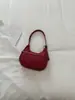 Bolsa de bolinho com design de nicho da moda, nova bolsa de ombro estilosa retrô transfronteiriça em formato de meia-lua, bolsa versátil de ombro e transversal, moderna