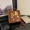 Mochila de Dibujos Animados de Nicho para Mujer 2026 Nueva Bolsa de Moda Retro Versátil para el Viaje Diario Mochila de Estudiante
