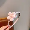 Diadema de tela con diseño de conejito de dibujos animados y flor, con dientes, antideslizante, adecuada para niños, versátil, no daña el cabello, accesorio para el cabello