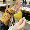 Año del Caballo Oro Puro 999 Llavero de Riqueza Instantánea Bolsa Mini de Oro para Labial Bolsa para Auriculares Colgante Pequeño Regalo Venta al por Mayor
