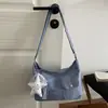 Nova Bolsa Jeans Outono 2026 Bolsa Transversal Casual Estilo Preguiçoso Bolsa de Tecido Artística para o Trabalho Bolsa Pequena Transversal