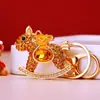 Chaveiro Cavalo Pequeno Dourado com Cravação de Diamante Tendência Nacional Pingente de Bolsa Feminina Argola de Chaveiro Presente Corporativo Liga de Zinco Completo em Diamante