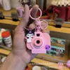 Llavero de Cámara de Proyección de Dibujos Animados Sanrio Colgante para Bolso Juguete para Niños Colgante Luminoso Pequeño Regalo Venta al por Mayor