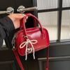 Bolso Bandolera Tipo Bolera para Mujer 2026 Verano Nuevo Estilo Bolso de Hombro Sencillo y Moderno Bolso de Mano de Gama Alta de Nicho de Moda