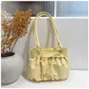 Bolsa de mão versátil com design de nicho de grande capacidade e estampa de bolinhas para mulheres, nova bolsa de ombro versátil, simples e elegante, estilo coreano moderno