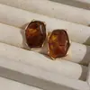 Aretes ovalados de resina plisada con aguja plateada, aretes minimalistas estilo Maillard, lujo ligero con sensación de alta gama, accesorios para la oreja modernos y versátiles