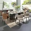 Silla de comedor minimalista italiana en negro, silla de diseñador moderna de lujo ligero con respaldo, sensación de alta gama para uso en hoteles y hogares, adecuada para mesas de isla y mesas de comedor