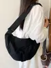 Bolso cruzado para mujer, simple y versátil, casual y para el trabajo, diseño ligero, bolso de hombro de nicho, bolso tipo dumpling