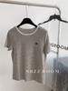 Camiseta de Manga Corta con Rayas Bordadas Pequeñas Reductora de Edad 95% Algodón para Mujer Estilo Casual Coreano Holgado Top Tendencia Verano 2025