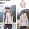 Chaqueta 3 en 1 estilo Luotuo para hombre y mujer, cintura ajustable, corte ajustado, resistente al viento para exteriores, impermeable, cálida, ropa para viajes y montañismo