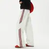 Colección de otoño de estilo americano: diseño a rayas moderno, versátil, corte holgado, pants casuales, pierna recta, pantalones de pierna ancha