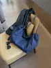 Bolso de hombro de mezclilla para mujer, nuevo modelo de verano 2026, bolso tote de cadena de gran capacidad, bolso de axila versátil y moderno para el trabajo