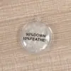 Atacado de etiquetas de marca de plumas de PVC transparente para edredons, pingente inflável, bolsa inflável heterossexual, logotipo fixo